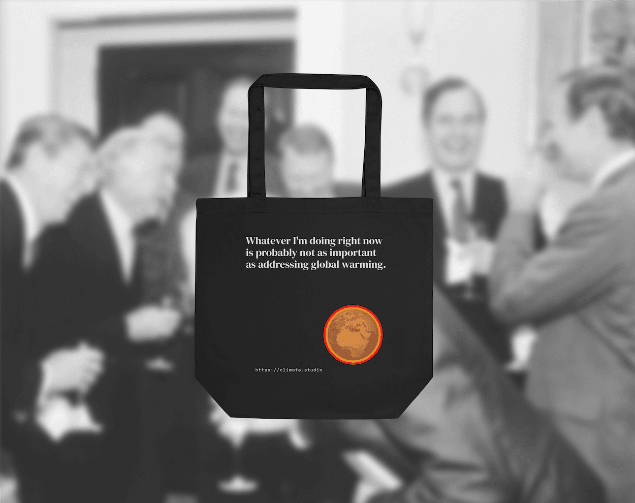 Black tote bag with climate message against neoliberal background