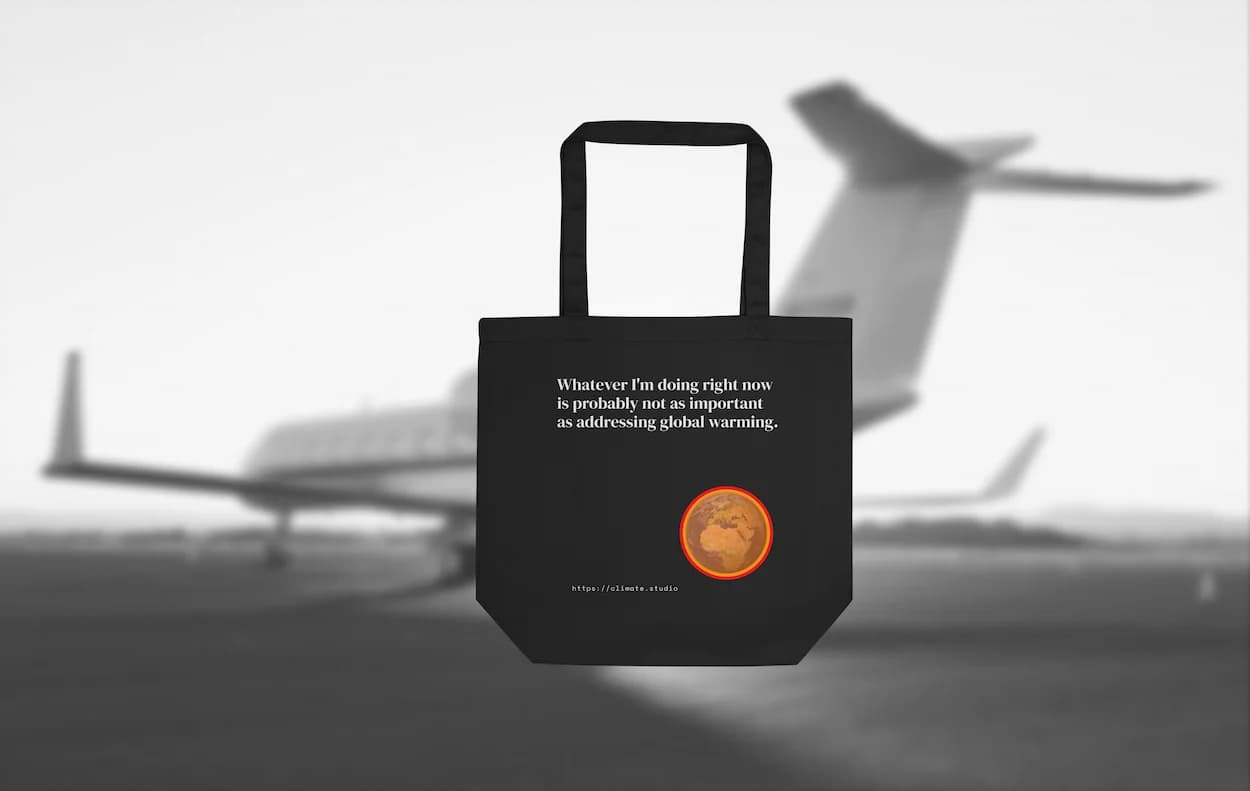 Black tote bag with climate message against private jet background