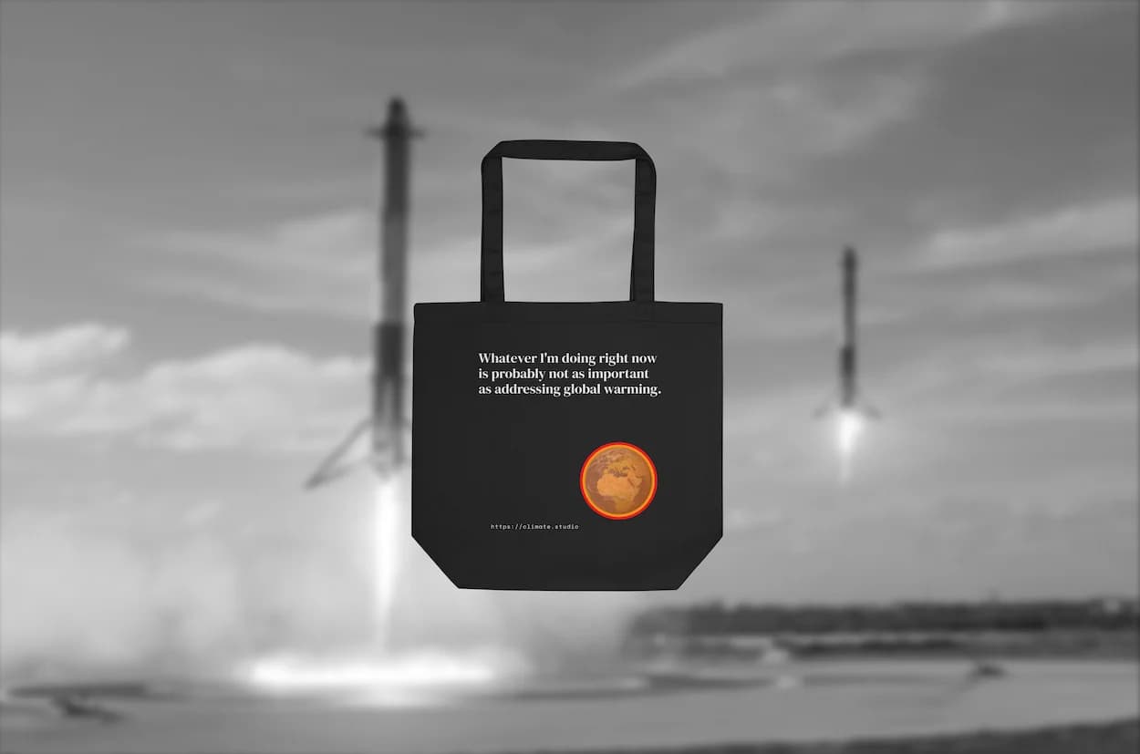 Black tote bag with climate message against rockets background